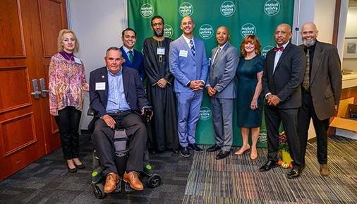 Distinguished Alumni Award recipients with President Ramsammy